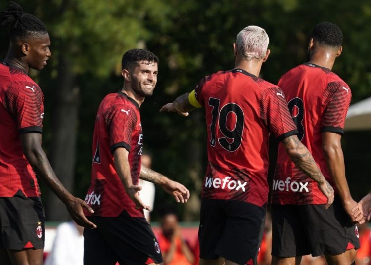 AC Milan players celebrate