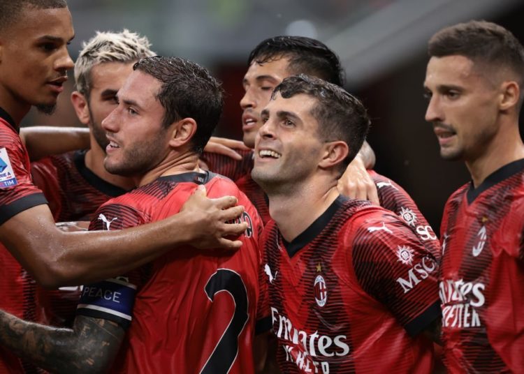 AC Milan players celebrate