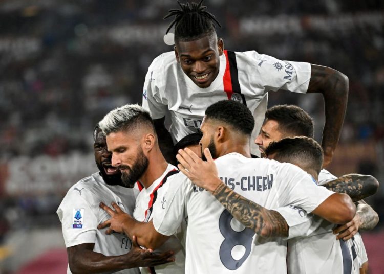 AC Milan players celebrate