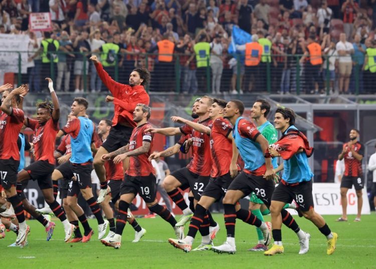 AC Milan players celebrate