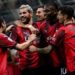 AC Milan players celebrate