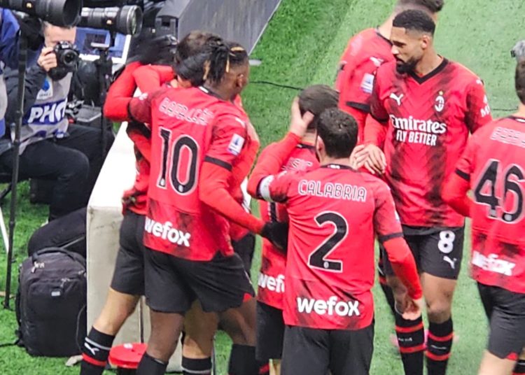 Yacine Adli celebrates with teammates after scoring vs Roma on January 14 2024 (Photo by Vito Angelè for Milanreports.com)