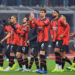 AC Milan players looking dejected