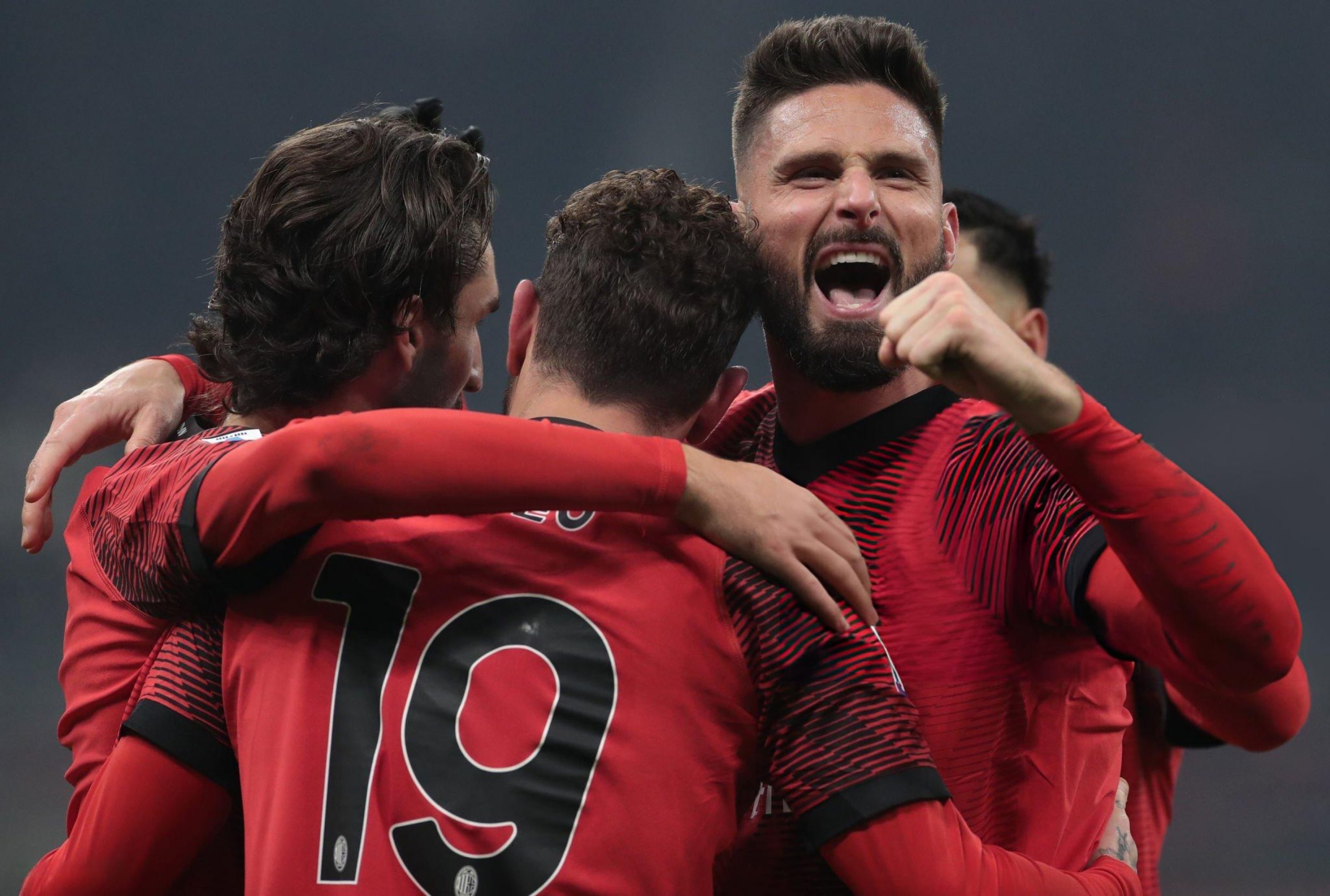 AC Milan players celebrate Olivier Giroud Yacine Adli Theo Hernandez