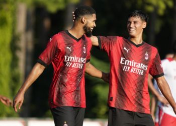 Ruben Loftus-Cheek and Tijjani Reijnders of AC Milan