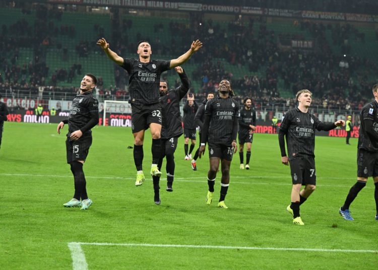 AC Milan players celebrate