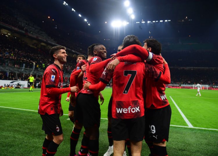 AC Milan players celebrate