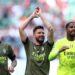 Olivier Giroud, Mike Maignan, and Theo Hernandez of AC Milan