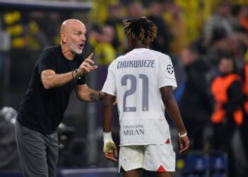 Samuel Chukwueze and Stefano Pioli of AC Milan