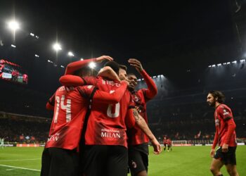 AC Milan players celebrate