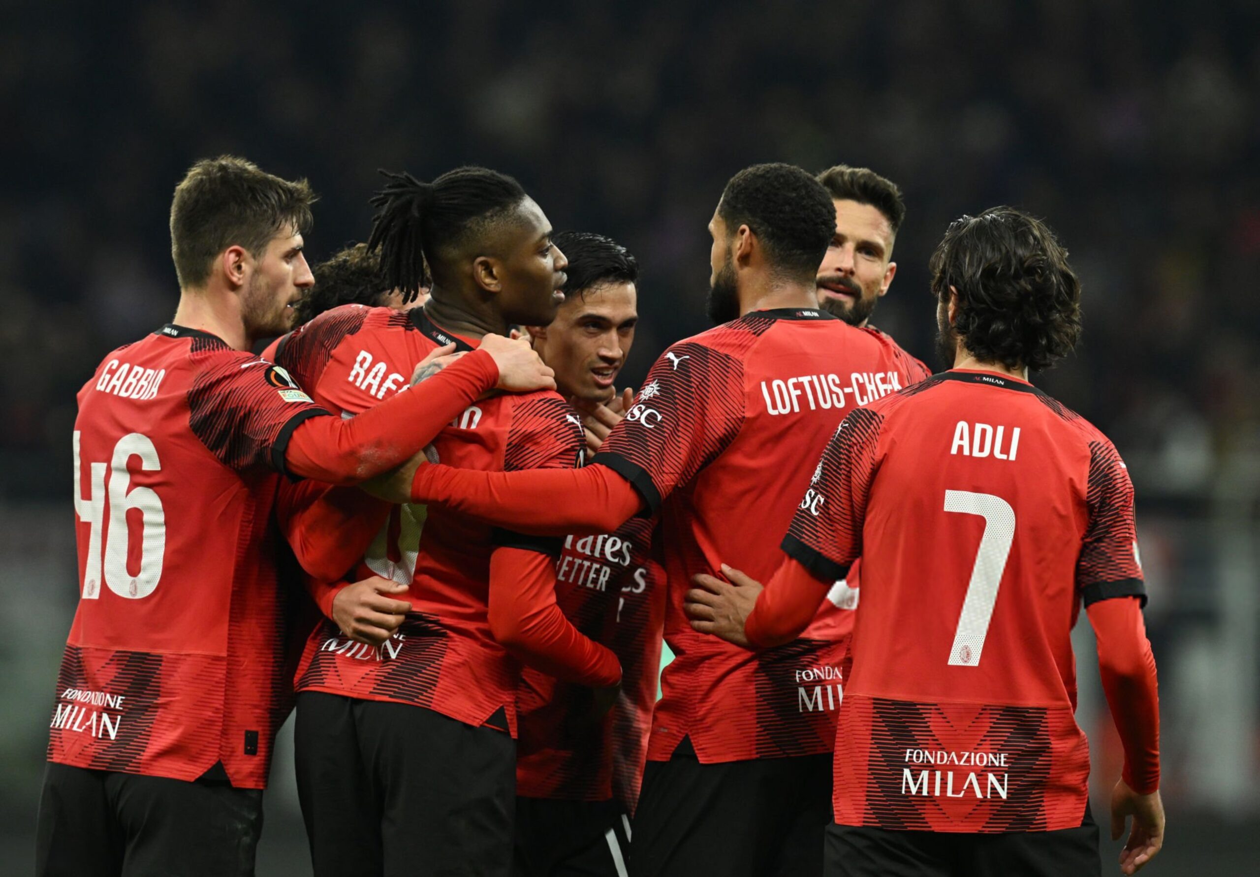 AC Milan players celebrate