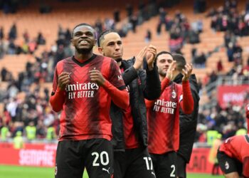 AC Milan players celebrate noah Okafor and Kalulu