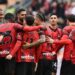 AC Milan players celebrate