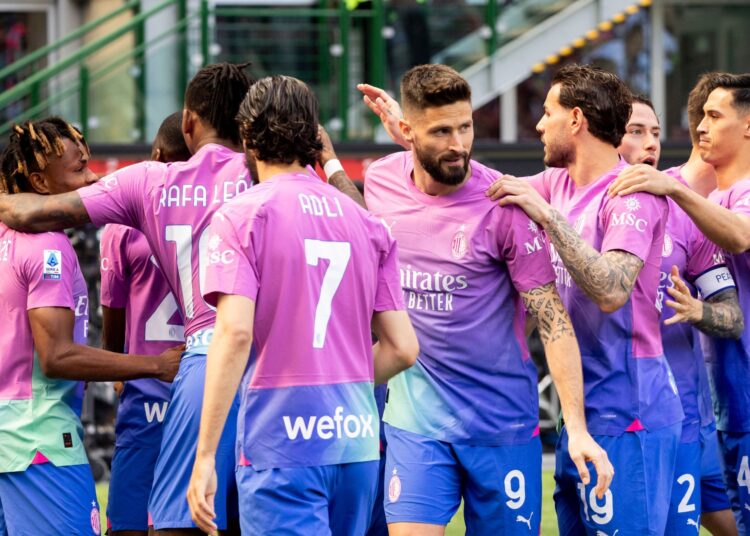 AC Milan players celebrate