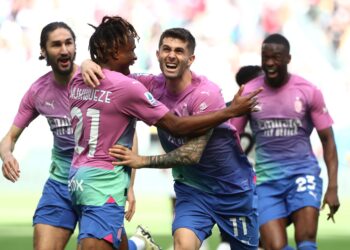 Christian Pulisic and Samuel Chukwueze of AC Milan