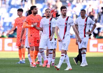 AC Milan players looking dejected