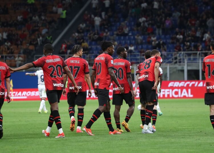 AC Milan players celebrate