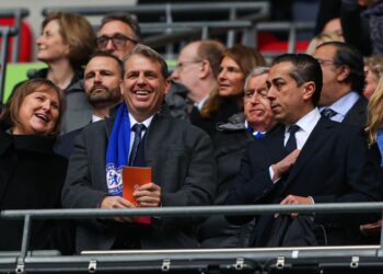 Todd Boehly (C), co-owner of Chelsea, and Behdad Eghbali (R), director of Chelsea, look on during the Carabao Cup Final match between Chelsea and Liverpool at Wembley Stadium on February 25, 2024 in London, England. (Photo by James Gill - Danehouse/Getty Images)