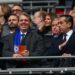 Todd Boehly (C), co-owner of Chelsea, and Behdad Eghbali (R), director of Chelsea, look on during the Carabao Cup Final match between Chelsea and Liverpool at Wembley Stadium on February 25, 2024 in London, England. (Photo by James Gill - Danehouse/Getty Images)