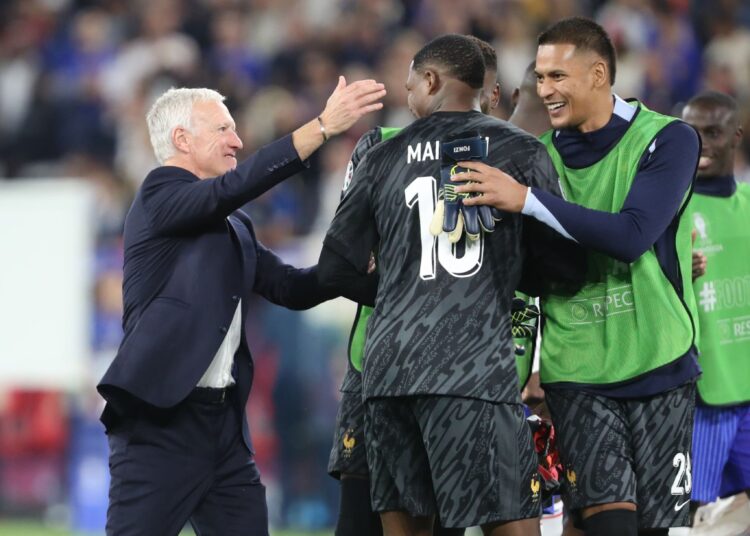 Mike Maignan and Didier Deschamps
