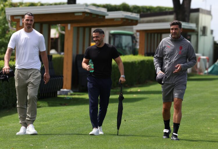 Paulo Fonseca, Geoffrey Moncada, and Zlatan Ibrahimovic (AC Milan via Getty Images)