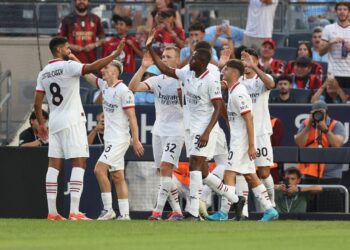 AC Milan players celebrate after scoring a goal against Manchester City at the Yankee stadium on July 27, 2024.
