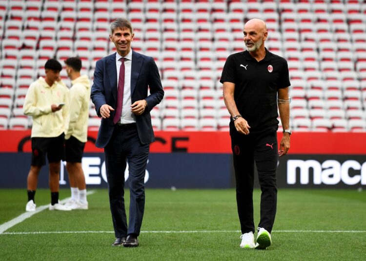 Frederic Massara and Stefano Pioli (AC Milan via Getty Images)