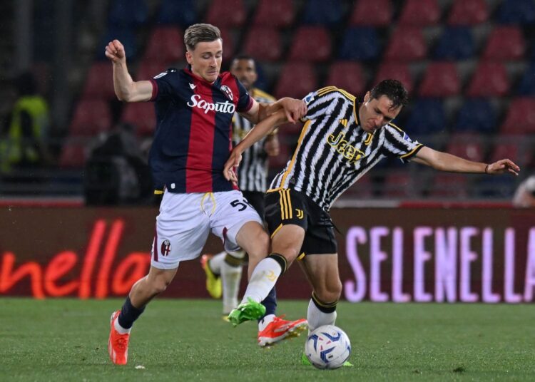 Alexis Saelemaekers and Federico Chiesa (Getty Images)