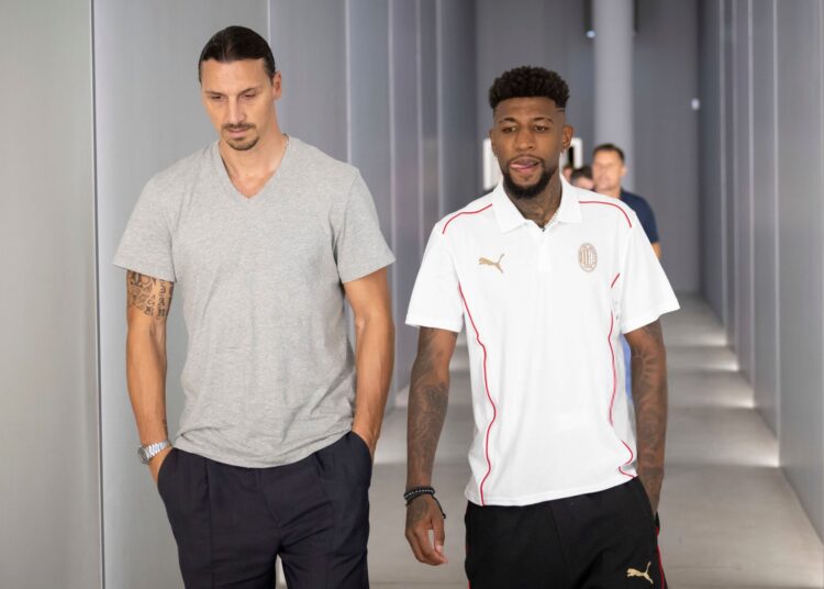 Emerson Royal and Zlatan Ibrahimovic of AC Milan