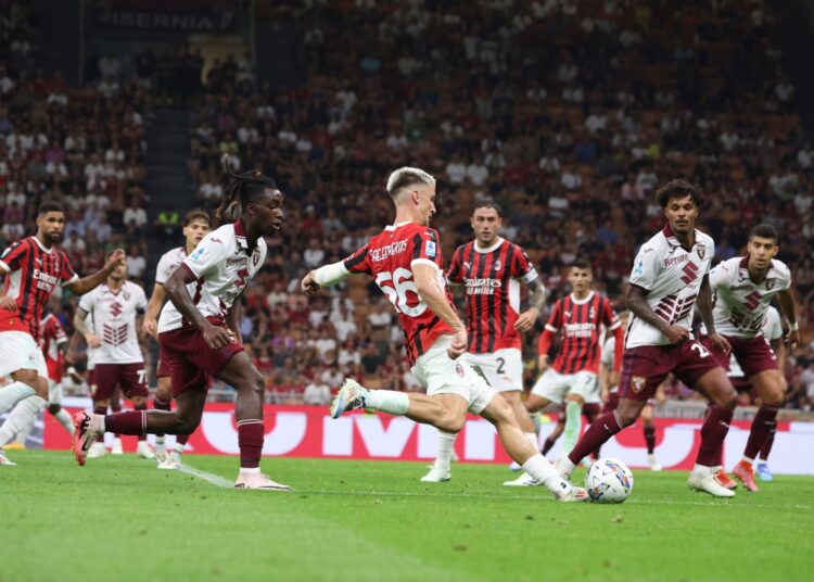MILAN, ITALY - AUGUST 17: Alexis Saelemaekers of AC Milan in action during the Serie A match between AC Milan and Torino at Stadio Giuseppe Meazza on August 17, 2024 in Milan, Italy. (Photo by Giuseppe Cottini/AC Milan via Getty Images)