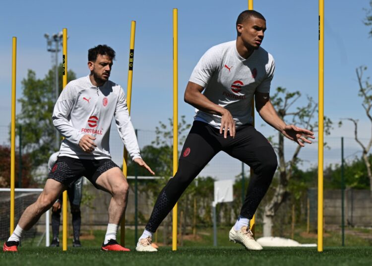 Alessandro Florenzi and Malick Thiaw (AC Milan via Getty Images)