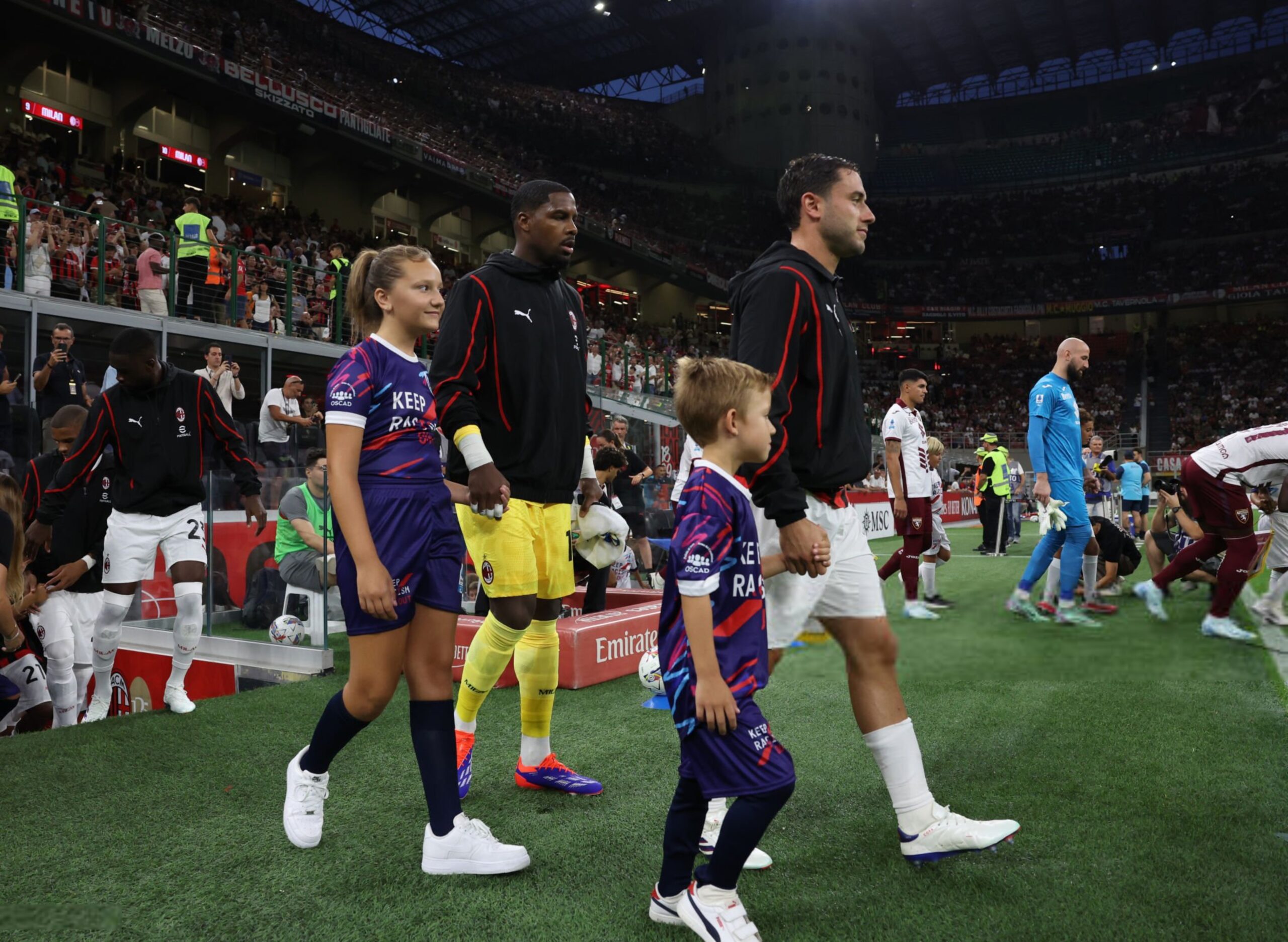 Davide Calabria and Mike Maignan (AC Milan via Getty Images)