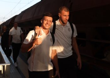Luka Jovic and Strahinja Pavlovic arrive at Parma station on August 23, 2024 in Parma, Italy. (Photo by Claudio Villa/AC Milan via Getty Images)