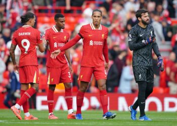 Liverpool's Virgil van Dijk and Alisson following the Premier League match at Anfield, Liverpool. Picture date: Saturday September 14, 2024. (Photo by Peter Byrne/PA Images via Getty Images)