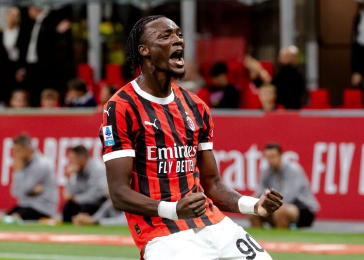 Tammy Abraham celebrates after scoring his first goal for AC Milan in the match against Venezia at the San Siro on September 14, 2024 (Getty Images)