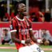 Tammy Abraham celebrates after scoring his first goal for AC Milan in the match against Venezia at the San Siro on September 14, 2024 (Getty Images)