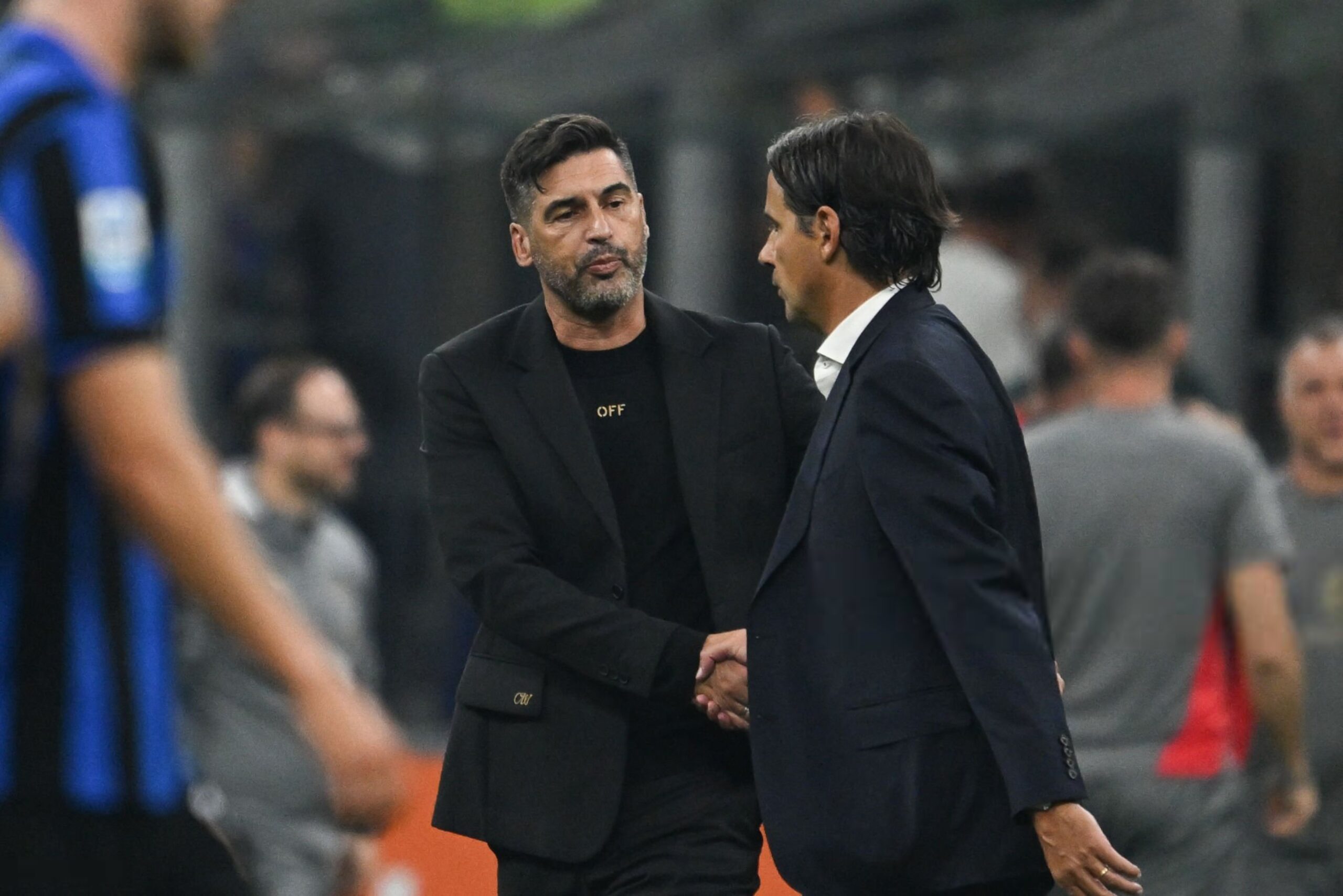 Inter's Simone Inzaghi and Paulo Fonseca of AC Milan