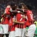 AC Milan players celebrate