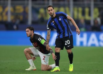 Inter's Hakan Calhanoglu and AC Milan's Davide Calabria