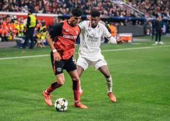 AC Milan's Emerson Royal and Piero Hincapie of Bayer Leverkusen