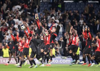 AC Milan players celebrate