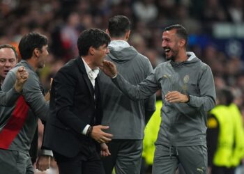 AC Milan's Paulo Fonseca celebrates with his staff after win vs Real Madrid