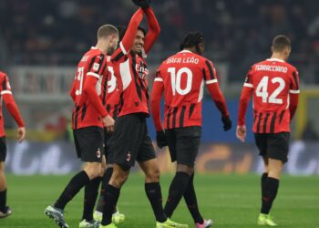 Tijjani Reijnders celebrates with AC Milan teammates