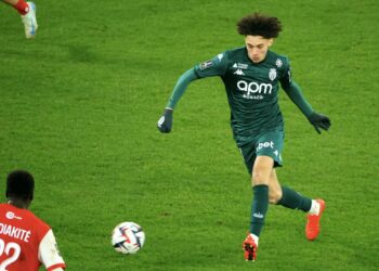 Maghnes Akliouche #11 of AS Monaco in action with Keito Nakamura #17 of Reims during the Ligue 1 match between Stade de Reims and AS Monaco at Stade Delaune on December 14, 2024 in Reims, France. (Photo by Xavier Laine/Getty Images) أكليوش
