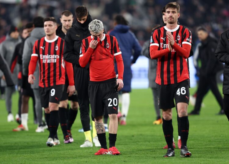 AC Milan players dejected