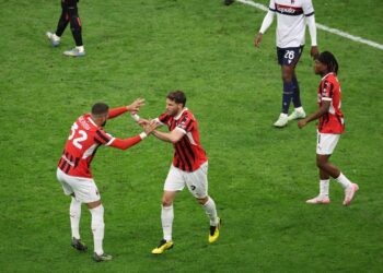 Santiago Gimenez celebrating with his AC Milan teammates