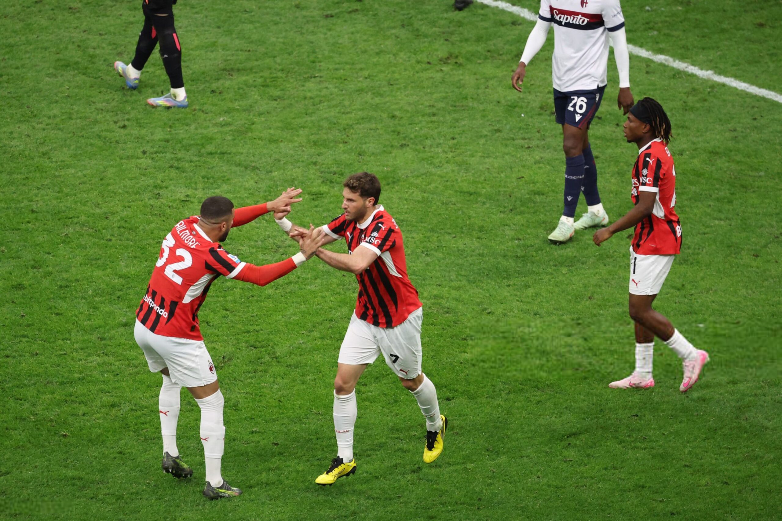 Santiago Gimenez celebrating with his AC Milan teammates