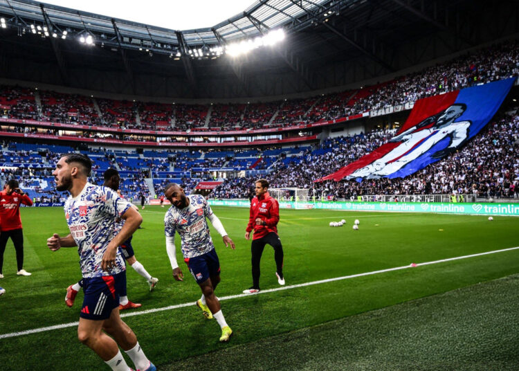 Lyon's players warm up before the French L1 football match between Olympique Lyonnais (OL) and SCO Angers at The Groupama Stadium in Decines-Charpieu, central-eastern France on May 17, 2025. (Photo by OLIVIER CHASSIGNOLE / AFP) (Photo by OLIVIER CHASSIGNOLE/AFP via Getty Images)