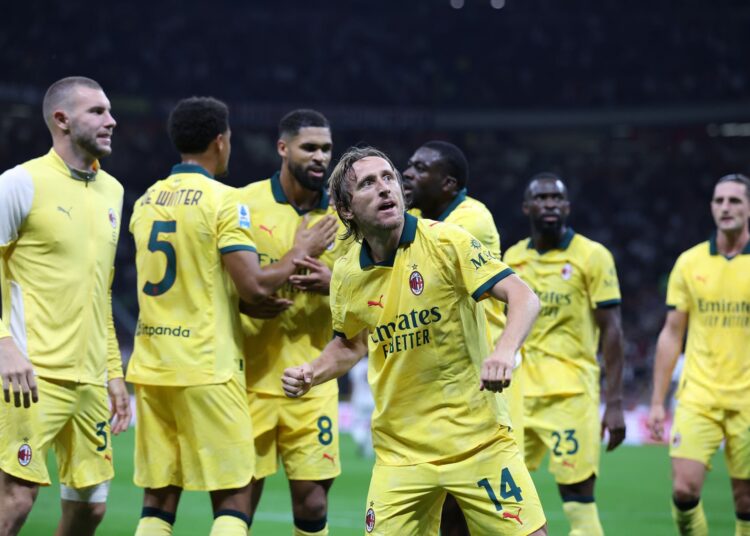 Luka Modric and his AC Milan teammates celebrating vs Bologna