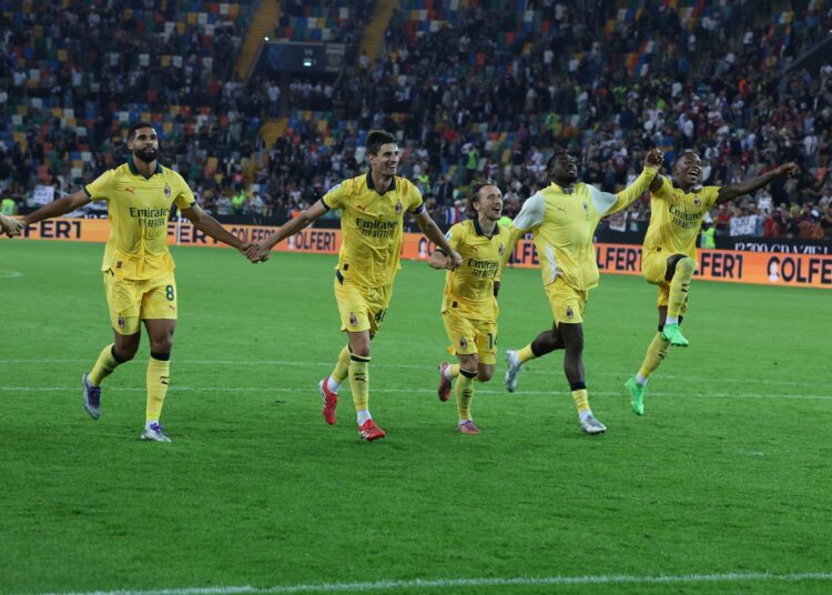 AC Milan players celebrating